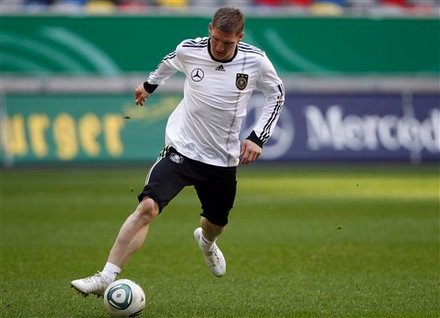 Bastien Schweinsteiger tests out a mystery pair of new adidas football boots